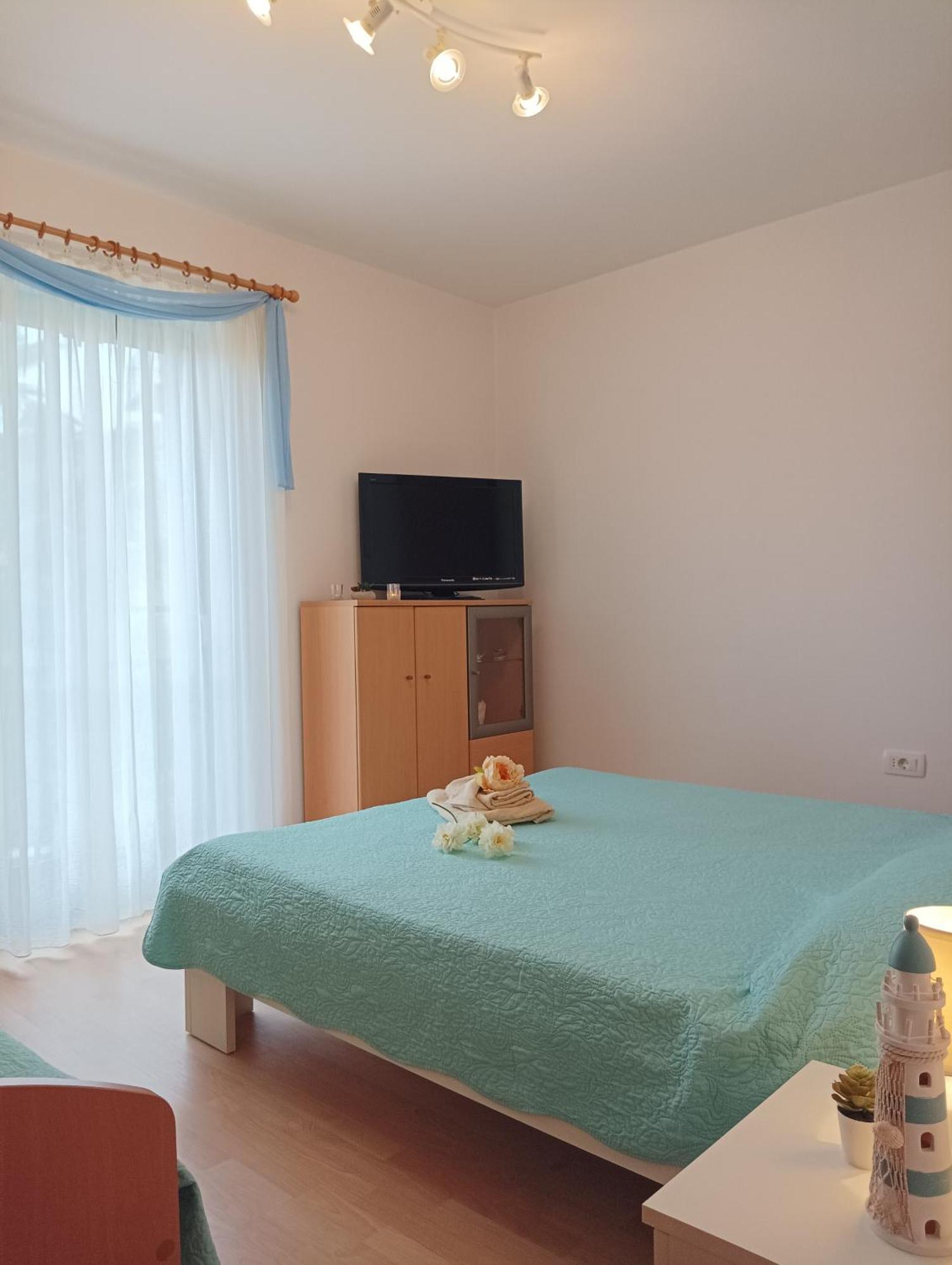 Apartment Milotic Ловран Экстерьер фото